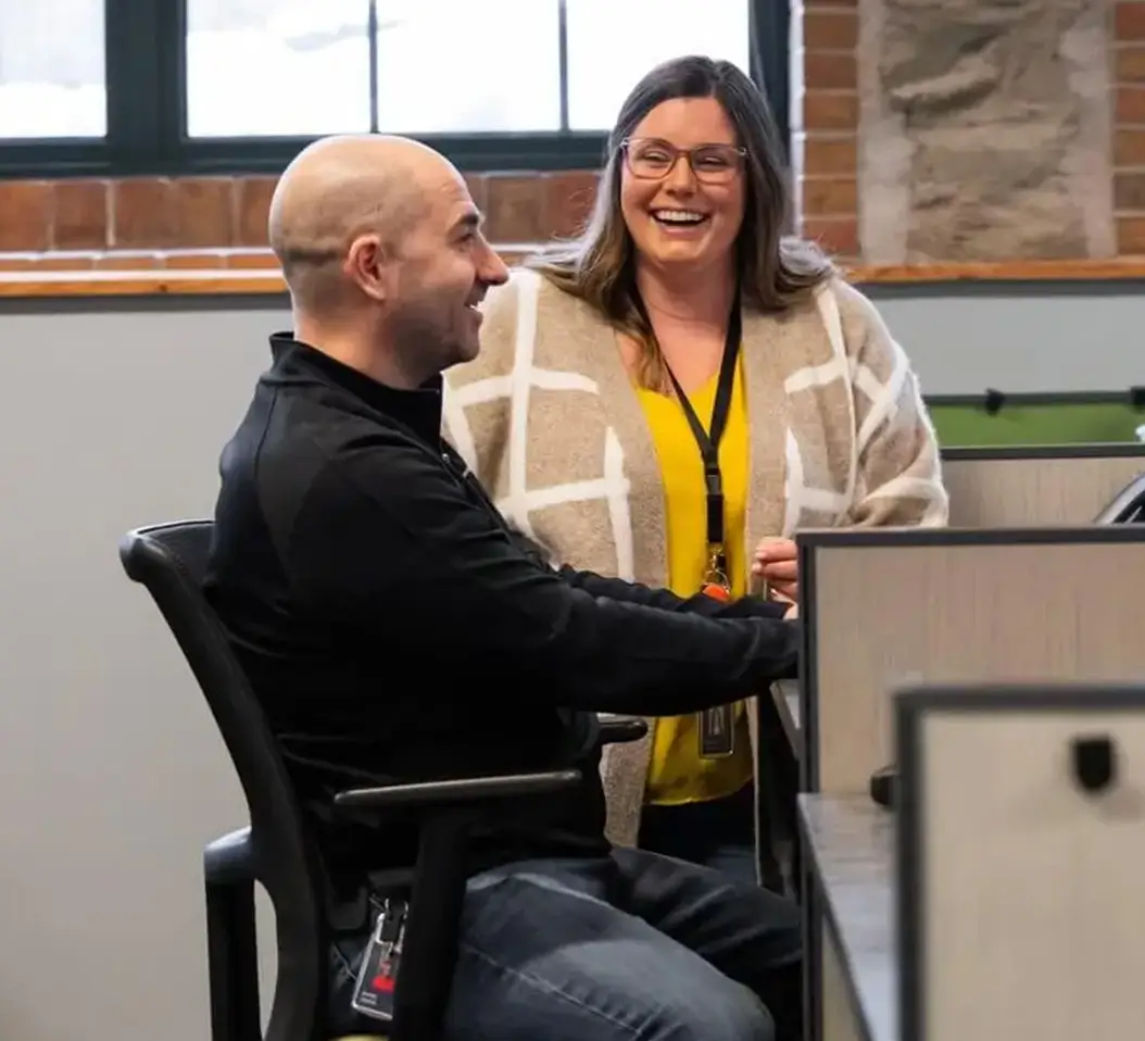 woman talking to coworker